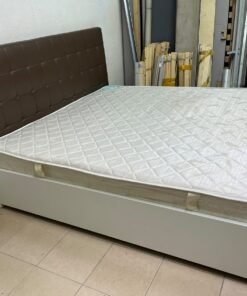A modern white wooden king-size bed, paired with a cushioned spring mattress and a brown faux-leather upholstered headboard. - Image 3