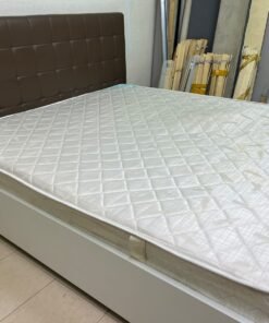A modern white wooden king-size bed, paired with a cushioned spring mattress and a brown faux-leather upholstered headboard. - Image 5