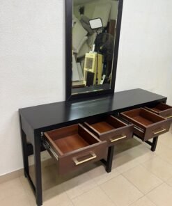 An ultra-long, modern console or vanity table featuring a black wooden frame, contrasting warm-toned wooden drawers, and gold-finished metal handles; it comes with a matching wall mirror. - Image 5
