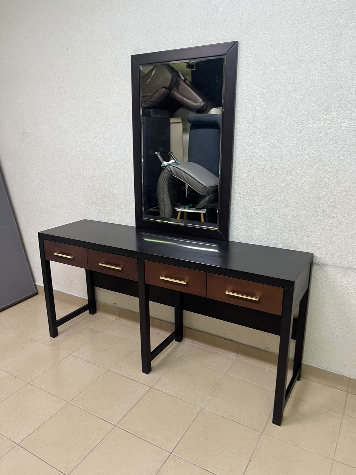 An ultra-long, modern console or vanity table featuring a black wooden frame, contrasting warm-toned wooden drawers, and gold-finished metal handles; it comes with a matching wall mirror. - Image 11