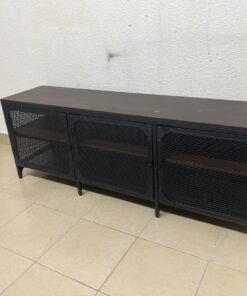 The FJÄLLBO TV unit from IKEA, featuring an industrial design with a solid wood top and black metal mesh doors. - Image 2