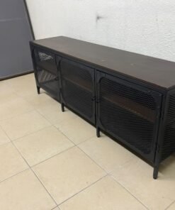 The FJÄLLBO TV unit from IKEA, featuring an industrial design with a solid wood top and black metal mesh doors. - Image 6