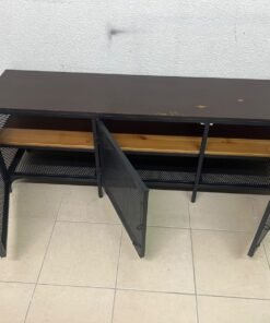 The FJÄLLBO TV unit from IKEA, featuring an industrial design with a solid wood top and black metal mesh doors. - Image 8