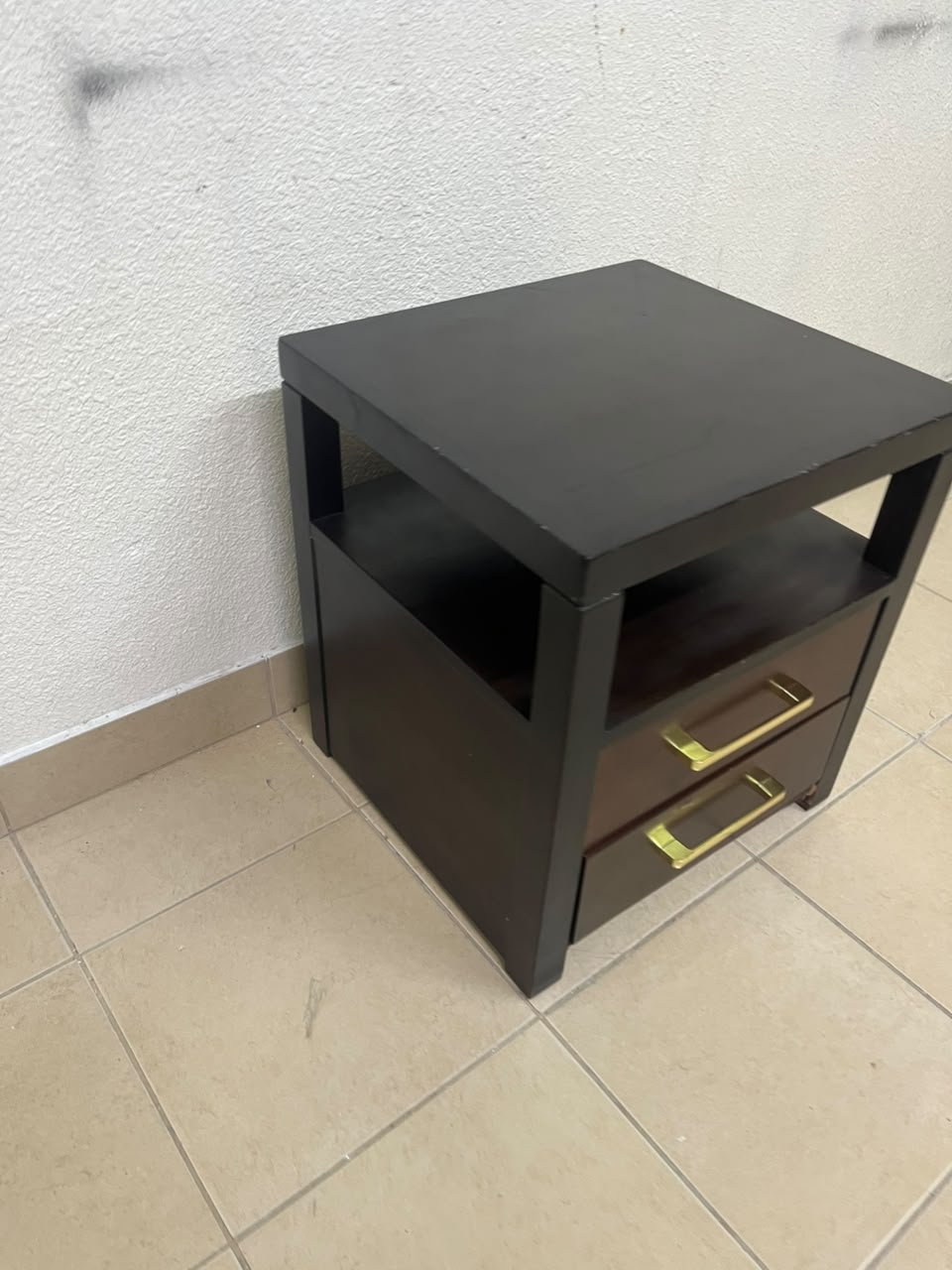 A modern wooden side table featuring two drawers and an open shelf, with a dark wood frame that contrasts with the reddish-brown drawer fronts, accented by slender metal handles. - Image 4