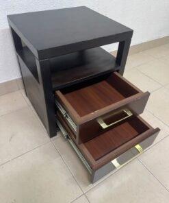 A modern wooden side table featuring two drawers and an open shelf, with a dark wood frame that contrasts with the reddish-brown drawer fronts, accented by slender metal handles. - Image 5