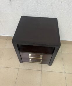 A modern wooden side table featuring two drawers and an open shelf, with a dark wood frame that contrasts with the reddish-brown drawer fronts, accented by slender metal handles. - Image 10