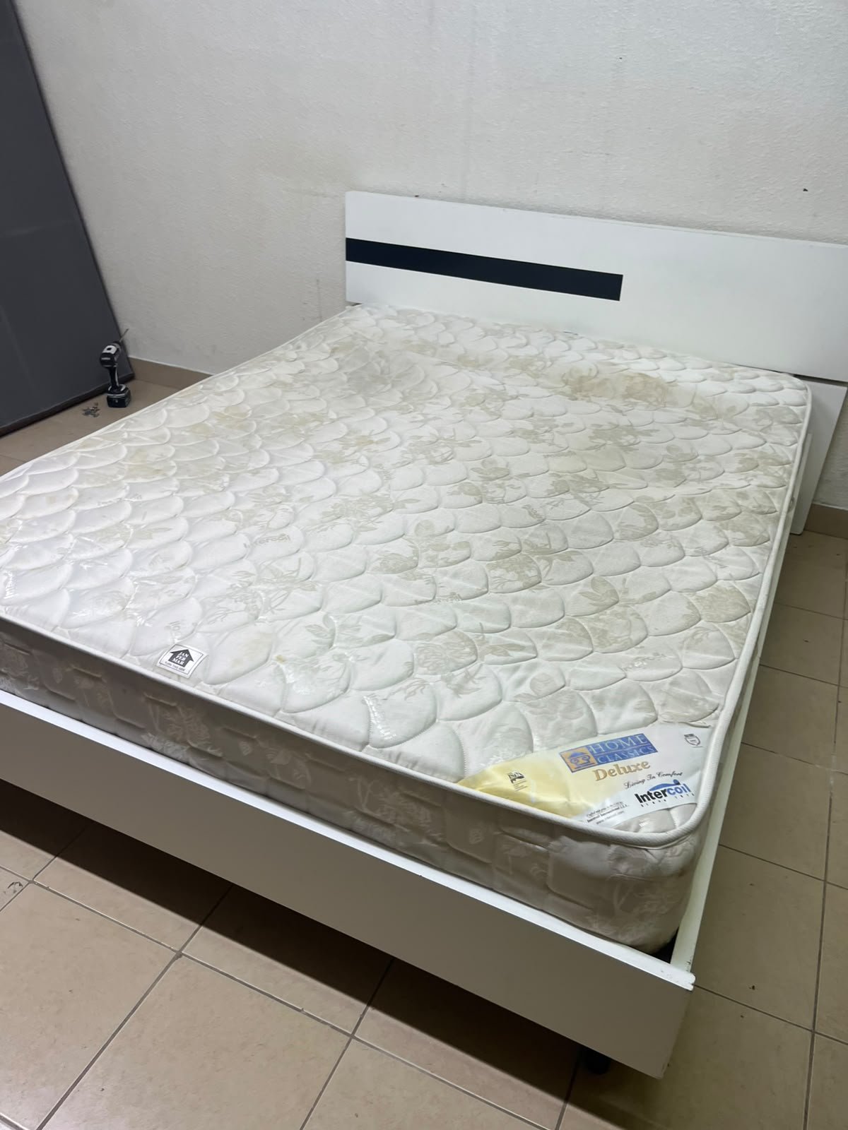 A white wooden bed frame paired with an "Intercoil Deluxe" sprung, cushioned mattress. - Image 2
