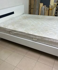 A white wooden bed frame paired with an "Intercoil Deluxe" sprung, cushioned mattress. - Image 4