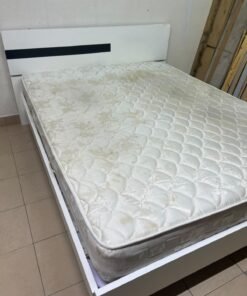 A white wooden bed frame paired with an "Intercoil Deluxe" sprung, cushioned mattress. - Image 6