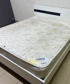 A white wooden bed frame paired with an "Intercoil Deluxe" sprung, cushioned mattress. - Image 7