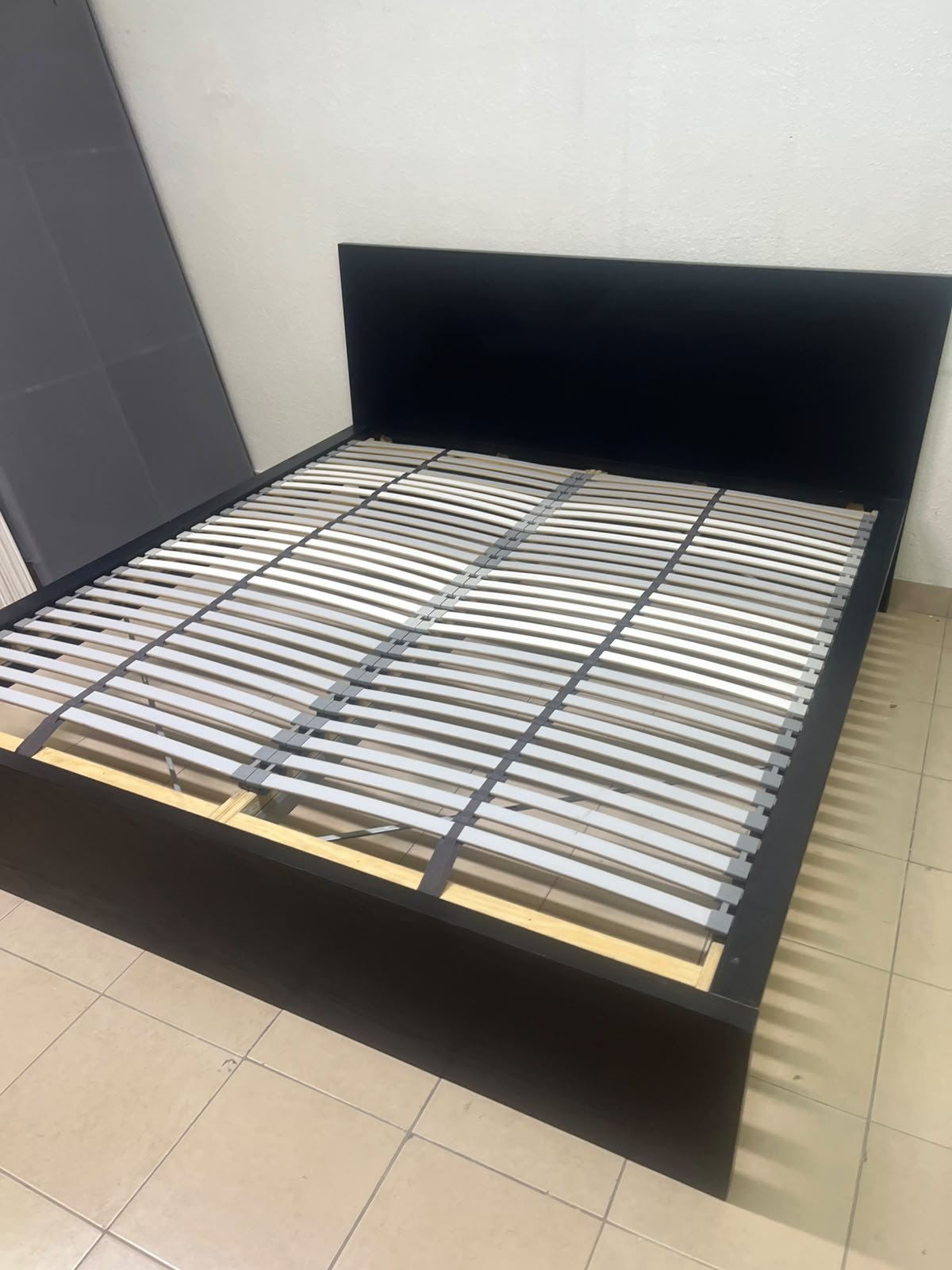 Black IKEA bed with a white "Silentnight Starlight" mattress. - Image 3