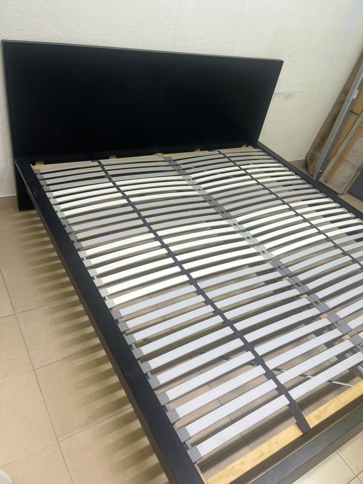Black IKEA bed with a white "Silentnight Starlight" mattress. - Image 4