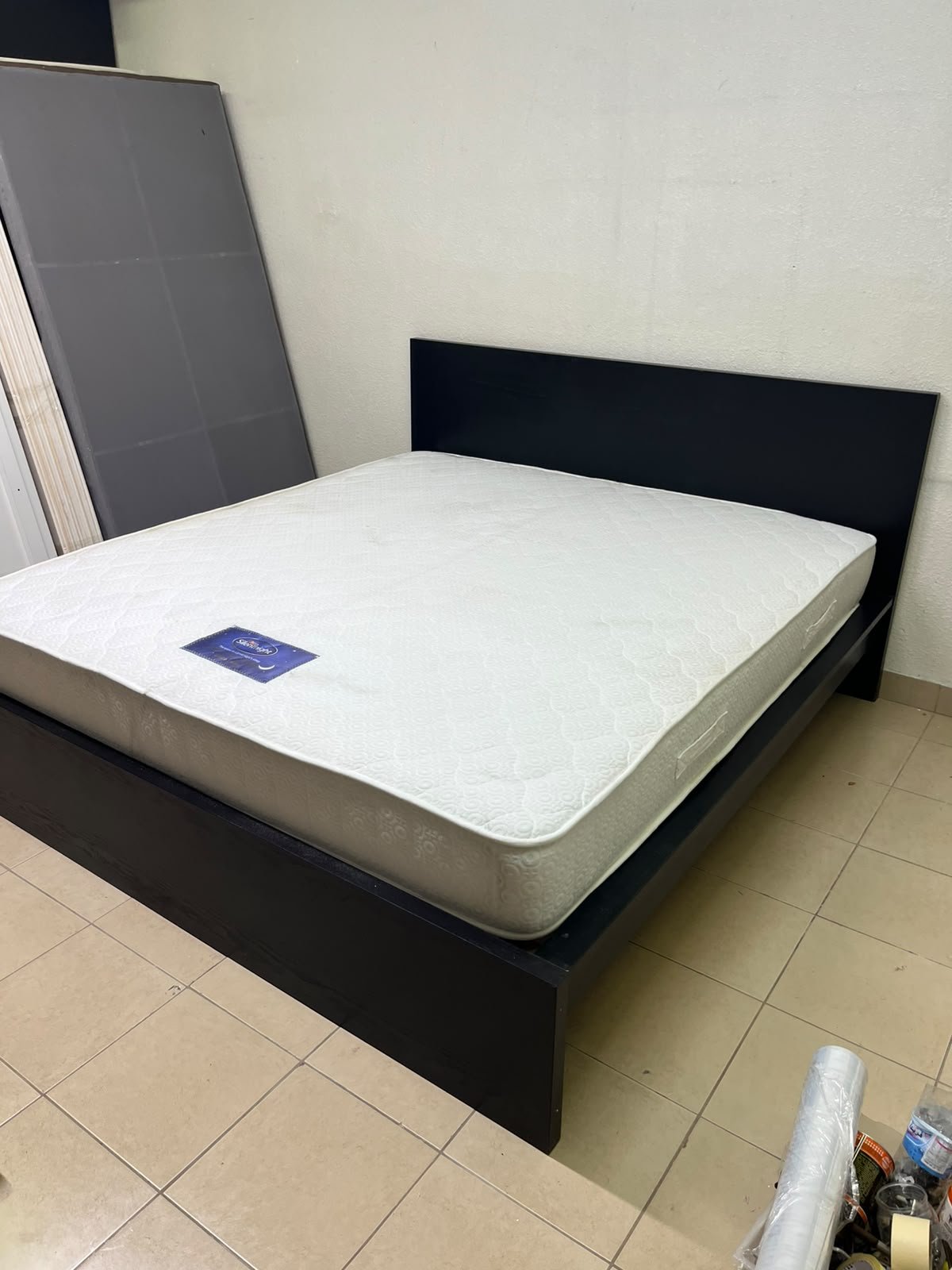 Black IKEA bed with a white "Silentnight Starlight" mattress. - Image 9