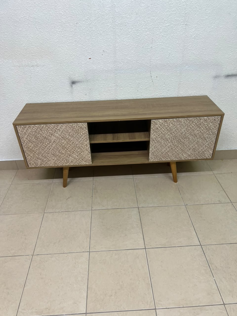 A modern wooden TV cabinet featuring distinctive textured woven doors and angled legs, closely resembling the Techno Mobili TV stand or Danube Home TV units. - Image 14