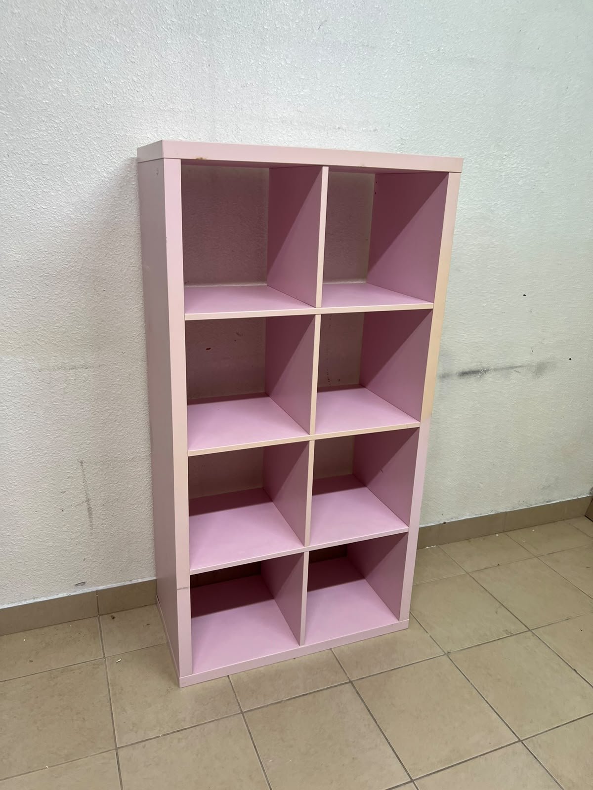 IKEA KALLAX shelving unit in pink, featuring a modular, 8-compartment cube design. - Image 4