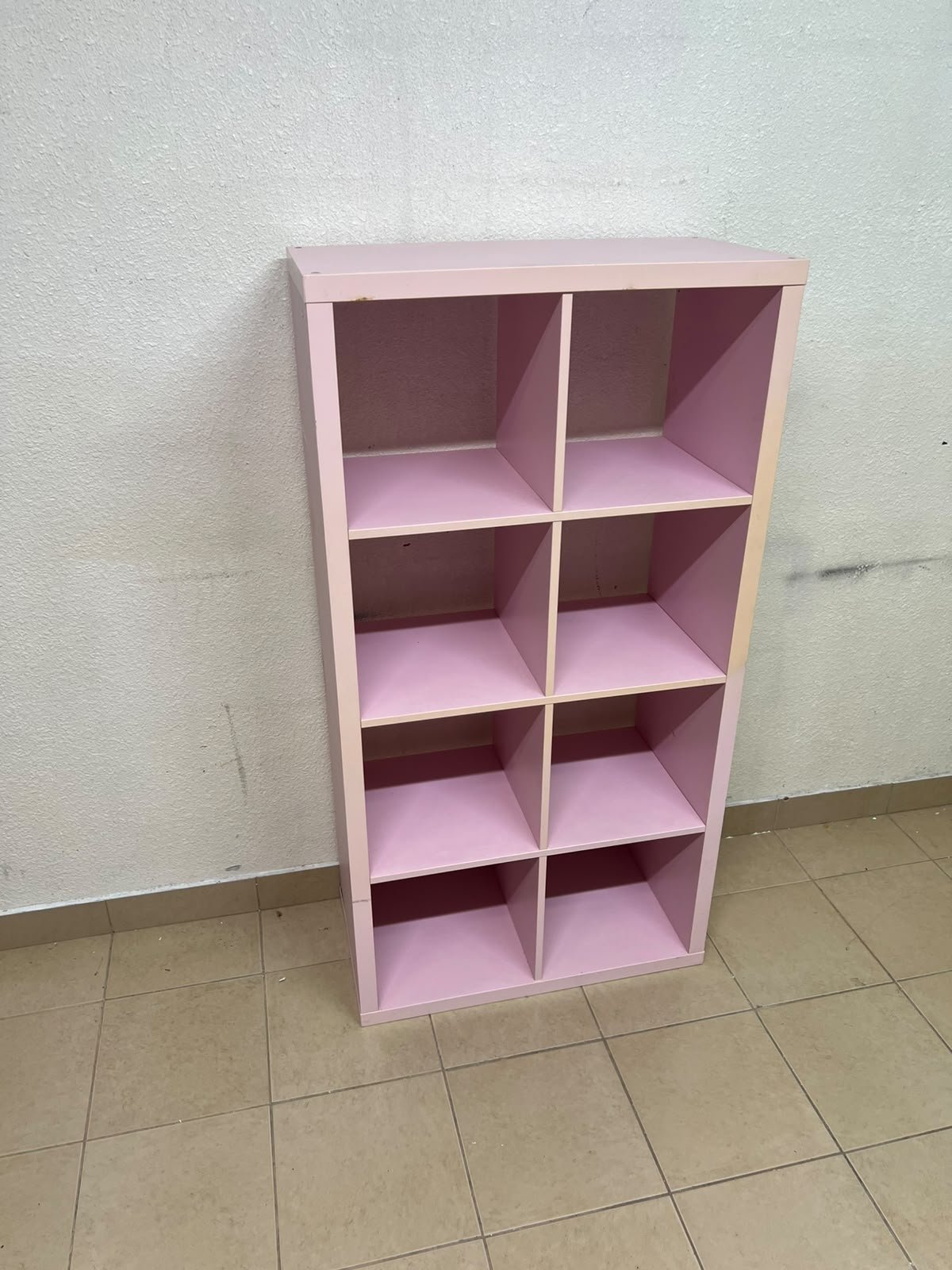 IKEA KALLAX shelving unit in pink, featuring a modular, 8-compartment cube design. - Image 5