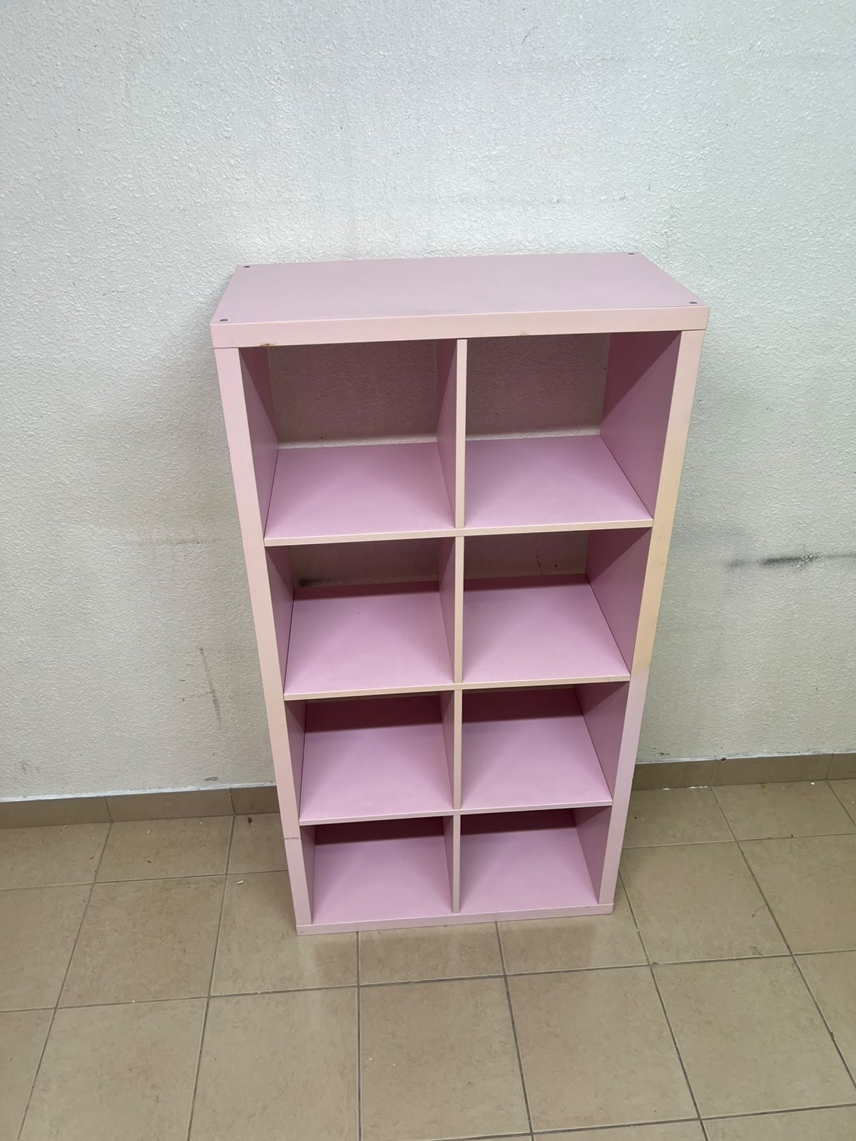 IKEA KALLAX shelving unit in pink, featuring a modular, 8-compartment cube design. - Image 7