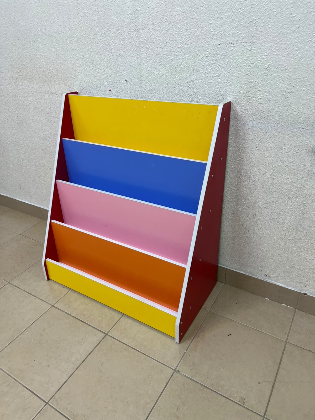 Colorful children's bookshelf with a multi-tiered wooden design. - Image 4