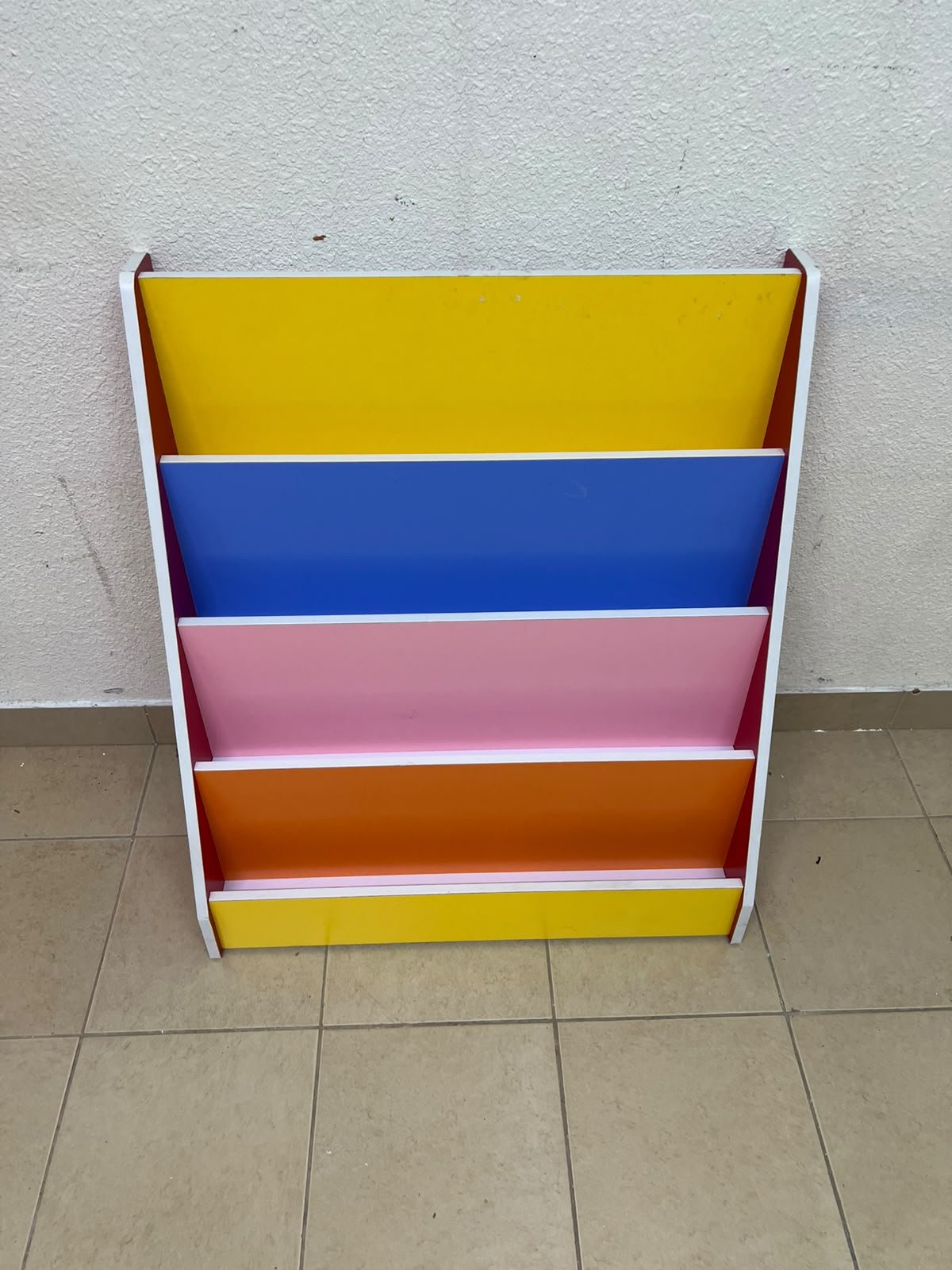 Colorful children's bookshelf with a multi-tiered wooden design. - Image 5