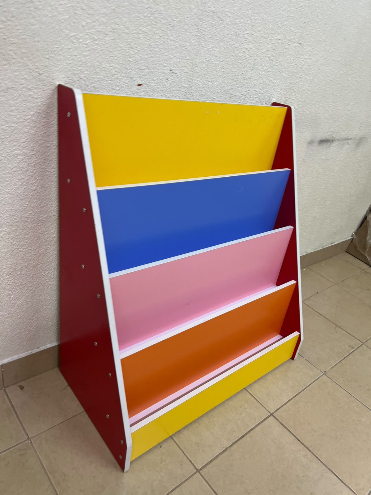 Colorful children's bookshelf with a multi-tiered wooden design. - Image 7