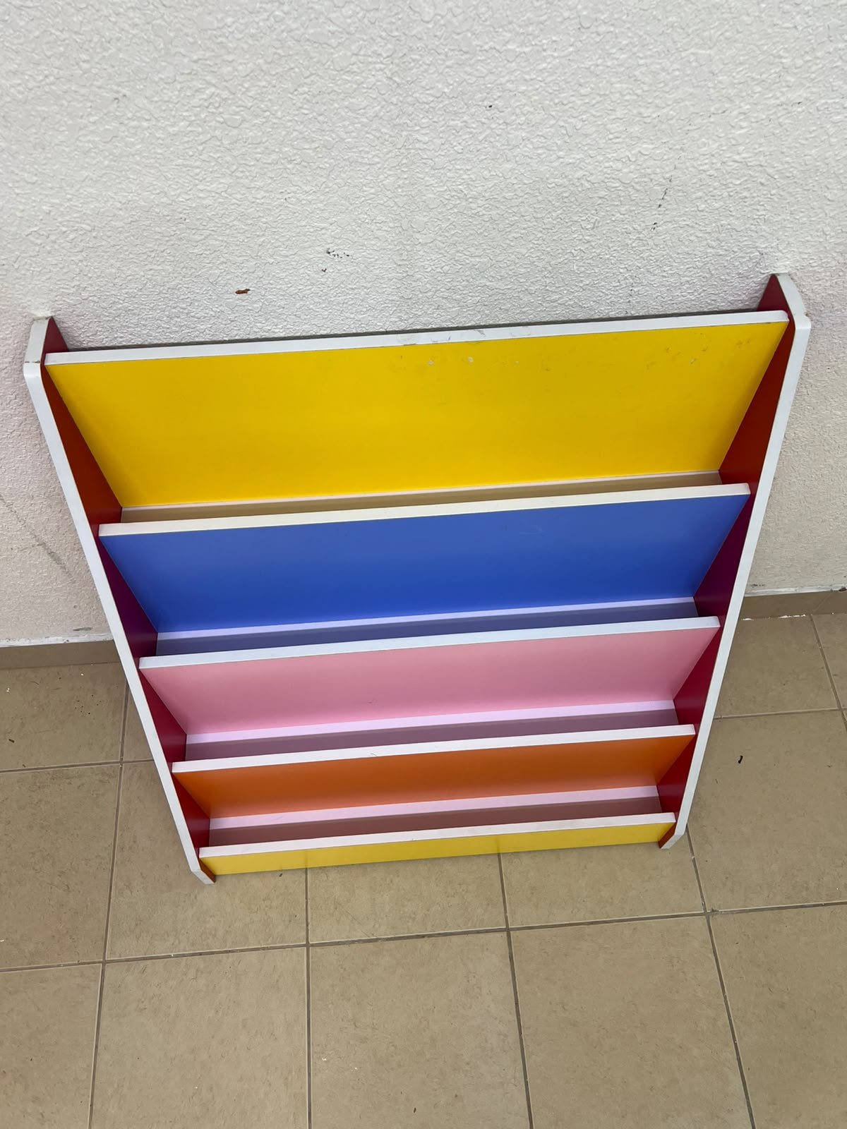 Colorful children's bookshelf with a multi-tiered wooden design. - Image 8