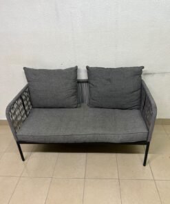 The two-seater outdoor sofa is a modern piece featuring a grey rope-woven design, a black metal frame, and matching back cushions. - Image 3