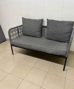 The two-seater outdoor sofa is a modern piece featuring a grey rope-woven design, a black metal frame, and matching back cushions.