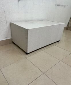 A coffee table upholstered in beige fabric with a textured feel and a neutral, linen-like appearance. - Image 4