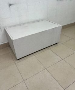 A coffee table upholstered in beige fabric with a textured feel and a neutral, linen-like appearance. - Image 8