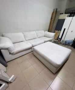 A modular white "Cloud-style" sectional sofa with a matching large ottoman, similar in design to options available at Danube Home. - Image 3