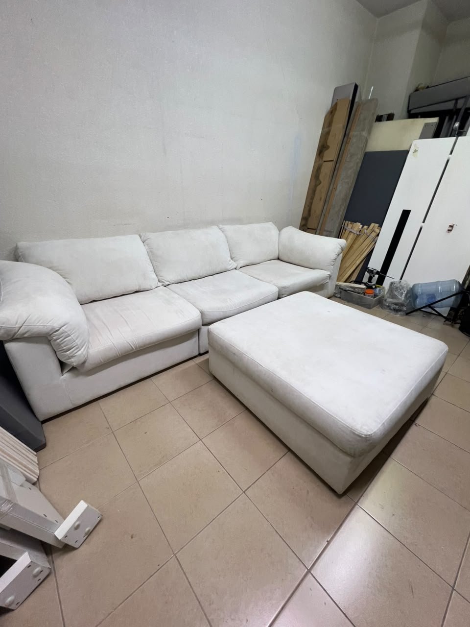 A modular white "Cloud-style" sectional sofa with a matching large ottoman, similar in design to options available at Danube Home. - Image 3