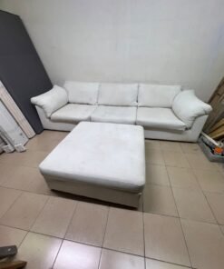 A modular white "Cloud-style" sectional sofa with a matching large ottoman, similar in design to options available at Danube Home. - Image 4