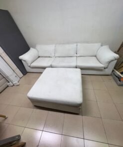 A modular white "Cloud-style" sectional sofa with a matching large ottoman, similar in design to options available at Danube Home. - Image 5