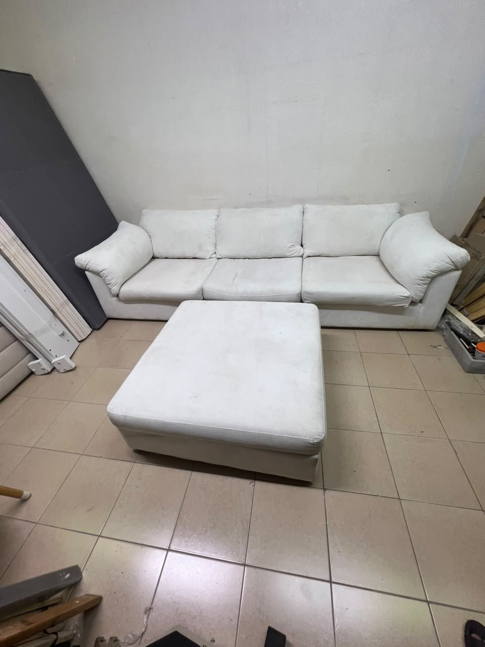 A modular white "Cloud-style" sectional sofa with a matching large ottoman, similar in design to options available at Danube Home. - Image 5