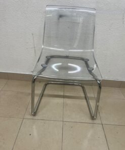 The IKEA "Tobias" chair, featuring a transparent acrylic seat and a chrome-plated steel frame. - Image 4