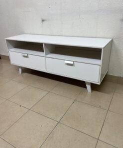 A modern, white, freestanding TV stand featuring angled legs and two large lower storage drawers, topped by open shelves. - Image 8