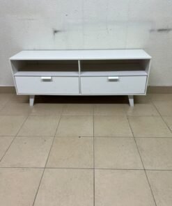 A modern, white, freestanding TV stand featuring angled legs and two large lower storage drawers, topped by open shelves. - Image 3
