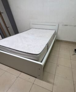 The image shows a white wooden bed frame with a matching headboard and a patterned mattress. - Image 4