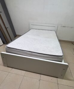 The image shows a white wooden bed frame with a matching headboard and a patterned mattress. - Image 7