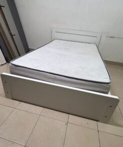 The image shows a white wooden bed frame with a matching headboard and a patterned mattress. - Image 10