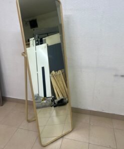 The IKEA IKORNNES ash wood standing mirror, featuring a distinctive rounded wooden frame and a hanging rail integrated into the rear stand. - Image 3