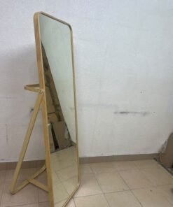 The IKEA IKORNNES ash wood standing mirror, featuring a distinctive rounded wooden frame and a hanging rail integrated into the rear stand. - Image 5