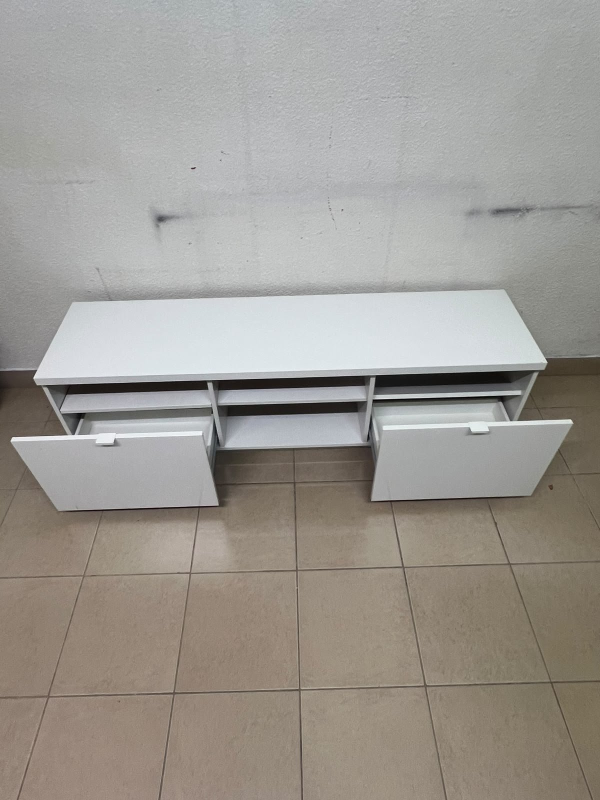 The IKEA BYÅS TV unit in high-gloss white features a sleek, modern design with two cabinets and open central shelves. - Image 10