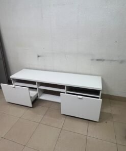 The IKEA BYÅS TV unit in high-gloss white features a sleek, modern design with two cabinets and open central shelves. - Image 12