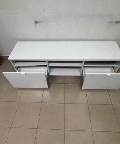 The IKEA BYÅS TV unit in high-gloss white features a sleek, modern design with two cabinets and open central shelves. - Image 5