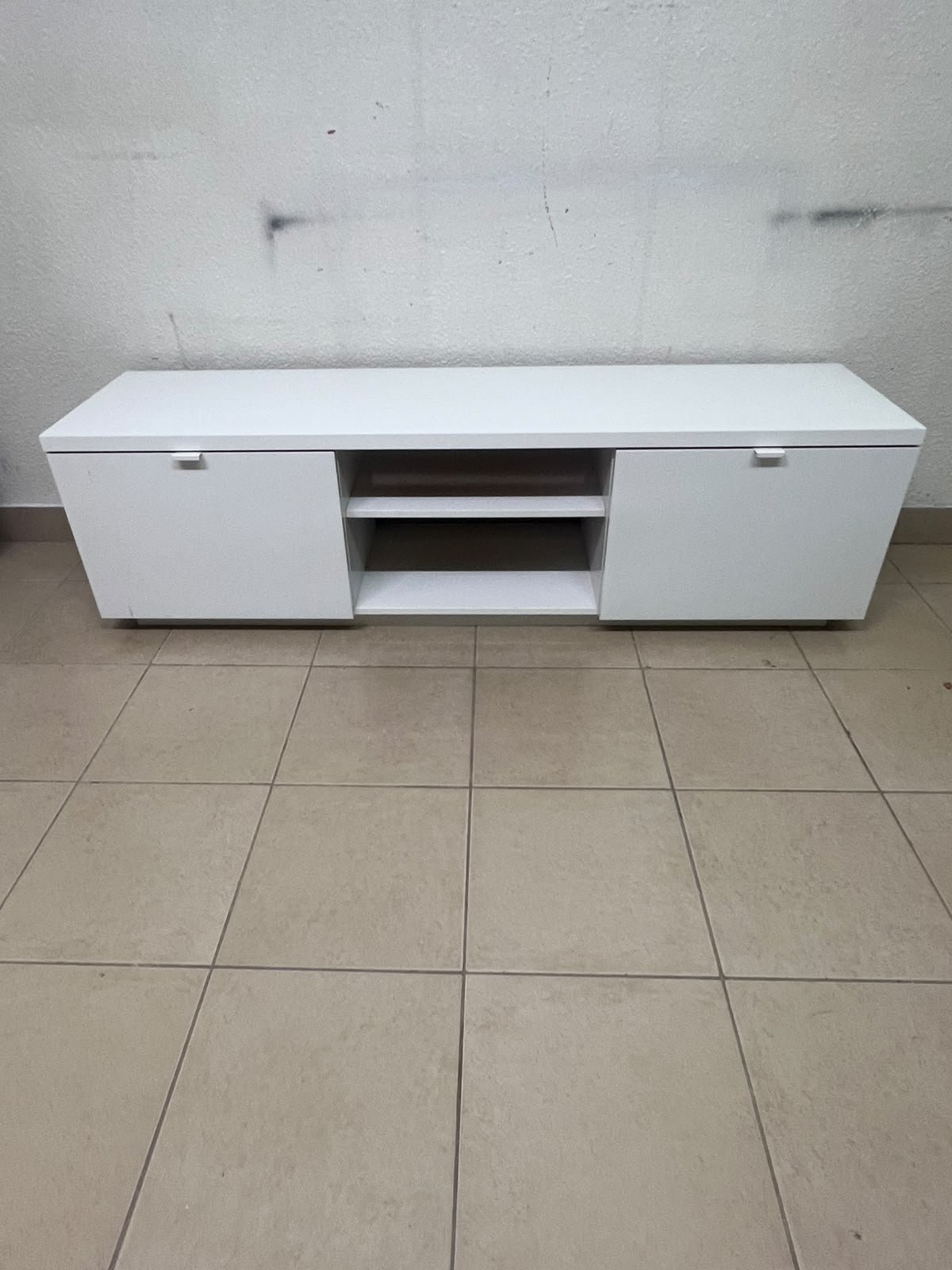 The IKEA BYÅS TV unit in high-gloss white features a sleek, modern design with two cabinets and open central shelves. - Image 7
