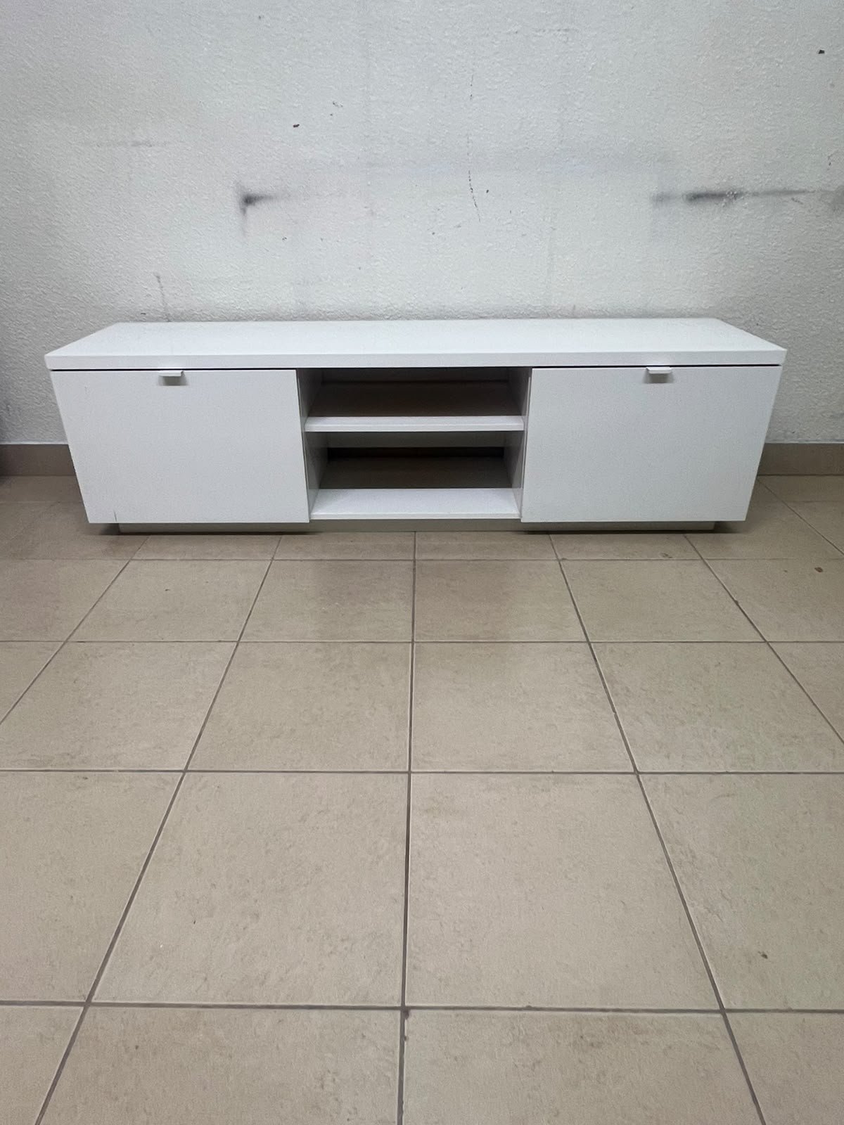The IKEA BYÅS TV unit in high-gloss white features a sleek, modern design with two cabinets and open central shelves. - Image 9