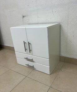 A white wooden storage cabinet featuring two upper doors and two lower drawers equipped with rectangular silver handles. - Image 5