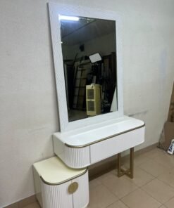 A modern vanity (makeup station) featuring a white striped design, a gold frame, and illuminated accents—a piece of contemporary bedroom décor. - Image 2