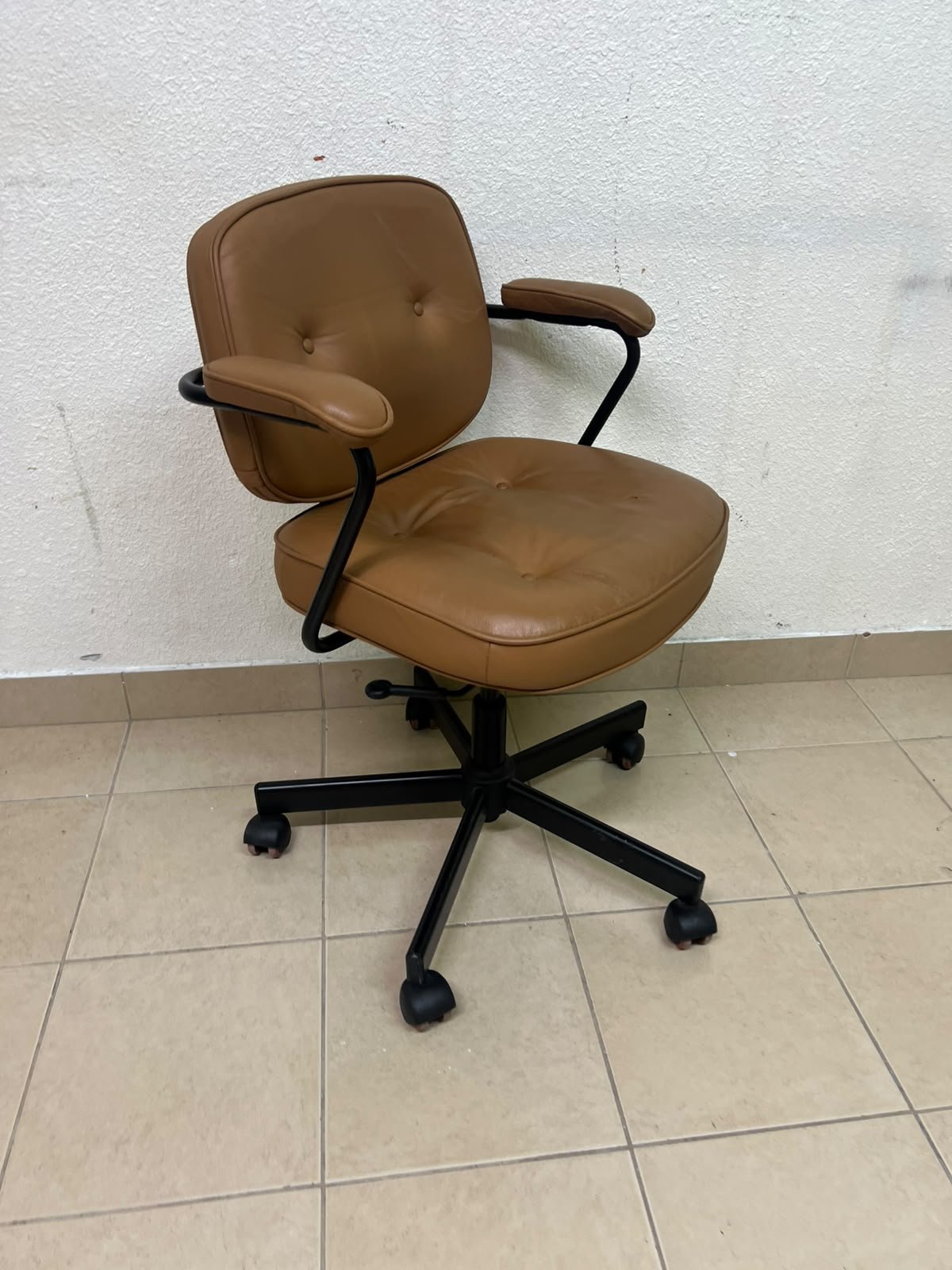 The ALEFJÄLL office chair from IKEA, crafted from golden-brown "Grann" leather and featuring distinctive tufted button detailing. - Image 2